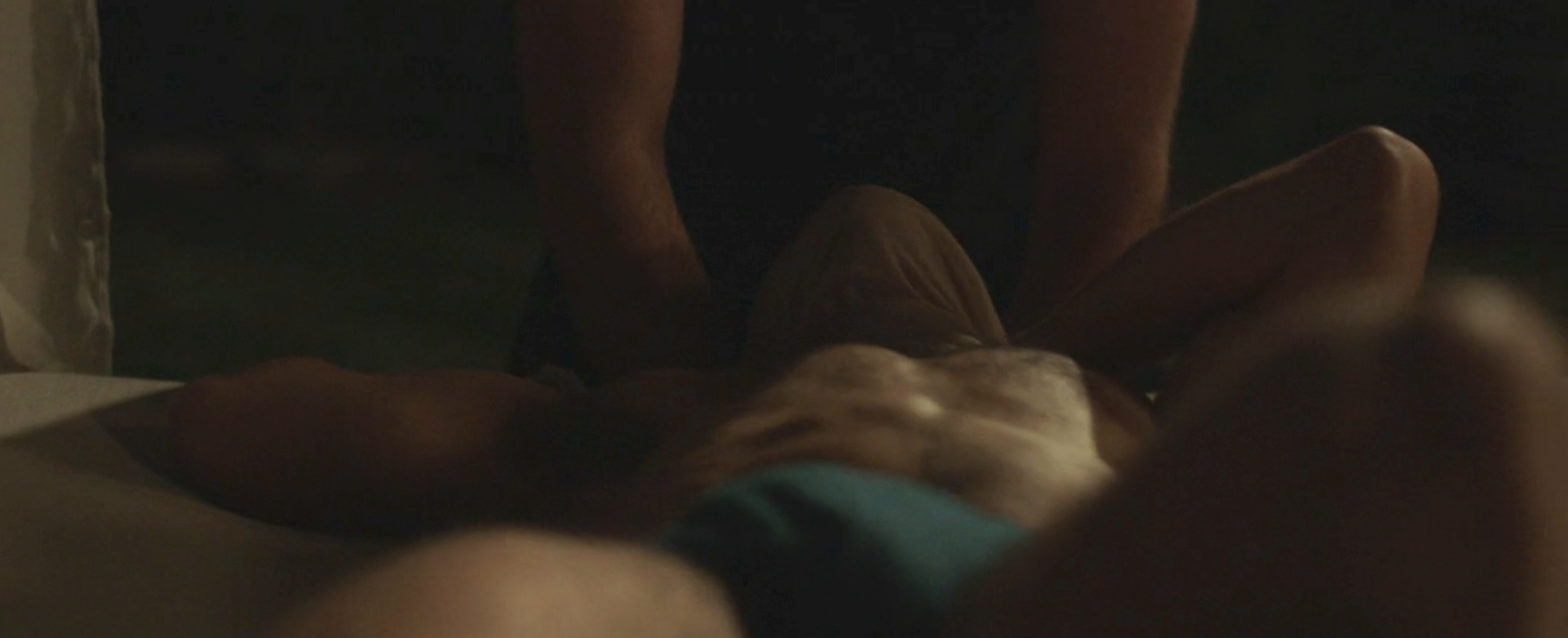 someone being smothered in Midnight Kiss